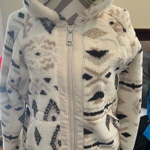 The North Face Cream, Black & Tan Patterned Sherpa Zip up jacket